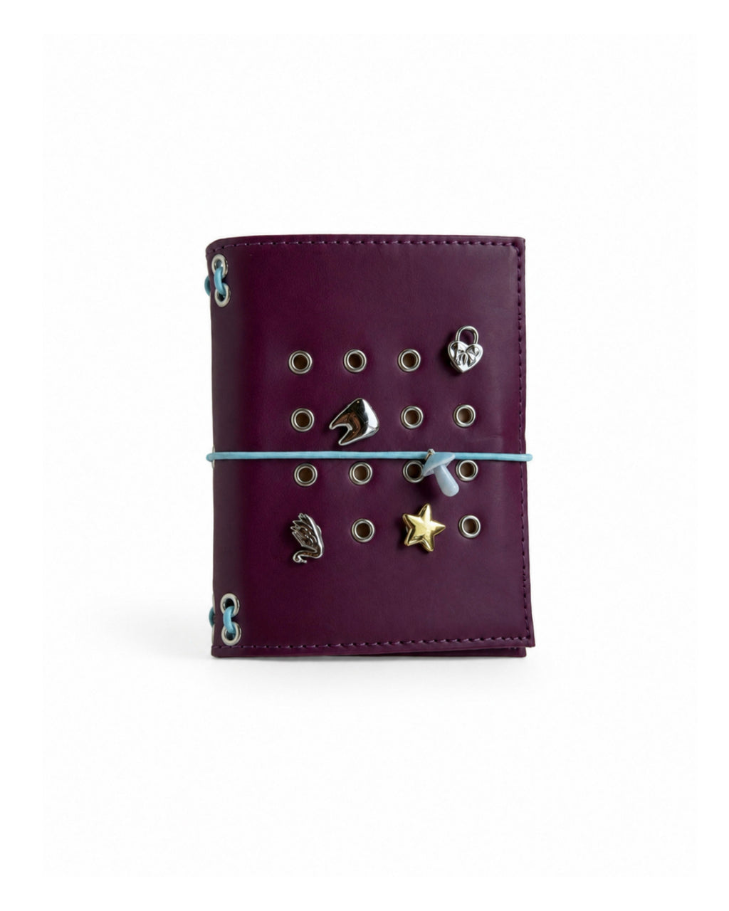 Burgundy Pocket Journal with a powder-blue elastic band and four removable KEPT cover charms on a white background.
