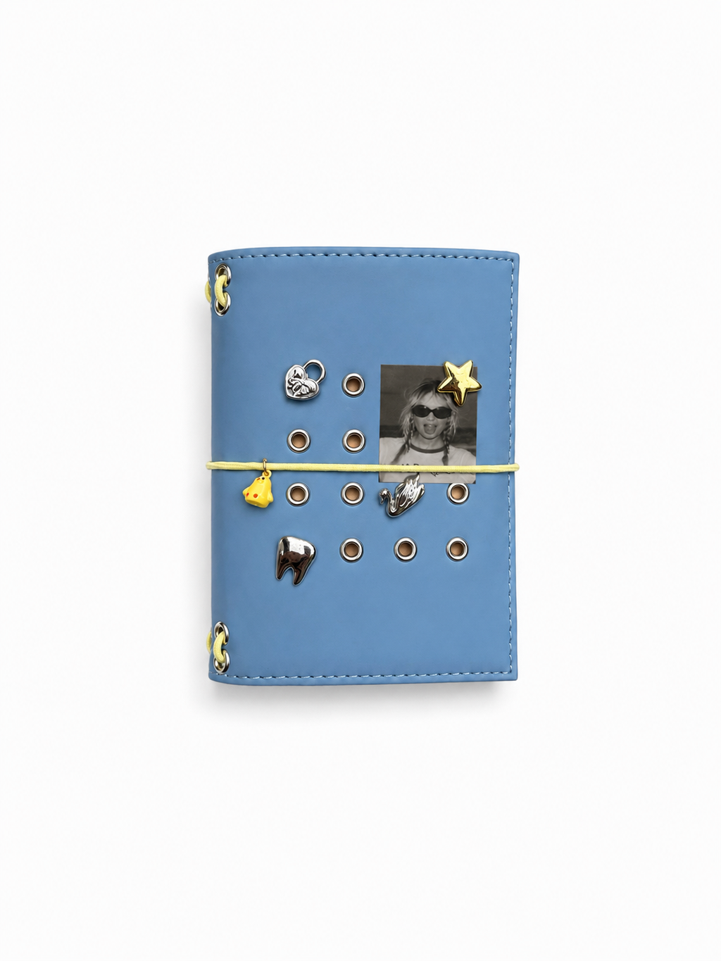 Mist Blue pocket journal with a butter-yellow elastic band, yellow chick charm, and removable KEPT cover charms
