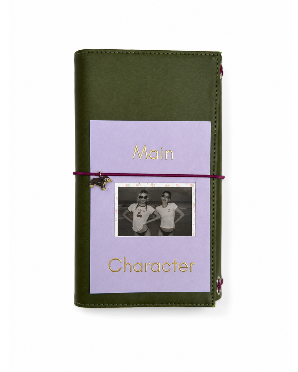 Back view of the Olive full size journal styled with its “Main Character” gold-foil photo keepsake card.