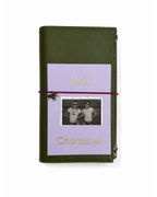 Back view of the Olive full size journal styled with its “Main Character” gold-foil photo keepsake card.