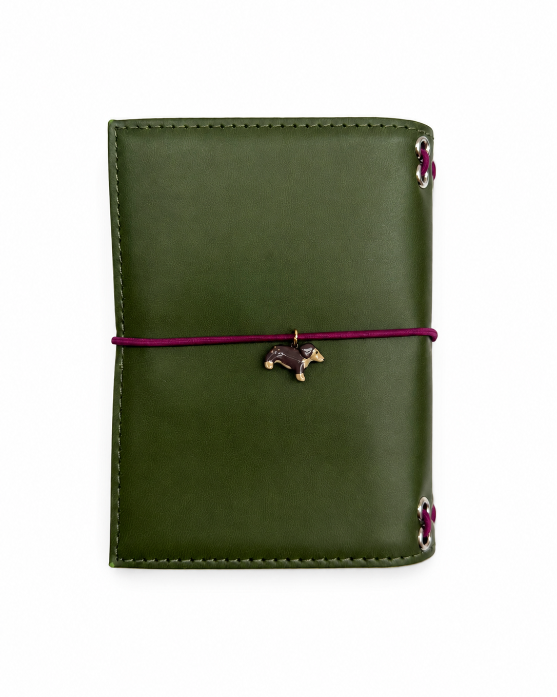 Back view of the Olive pocket journal with a burgundy elastic band and dachshund charm