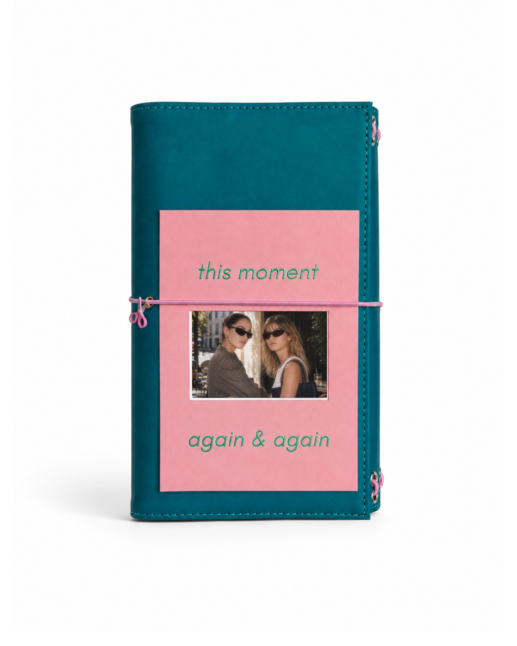 Teal Full Size Journal with a blush-pink elastic band and a pink “This Moment / Again & Again” photo keepsake card on a white background.