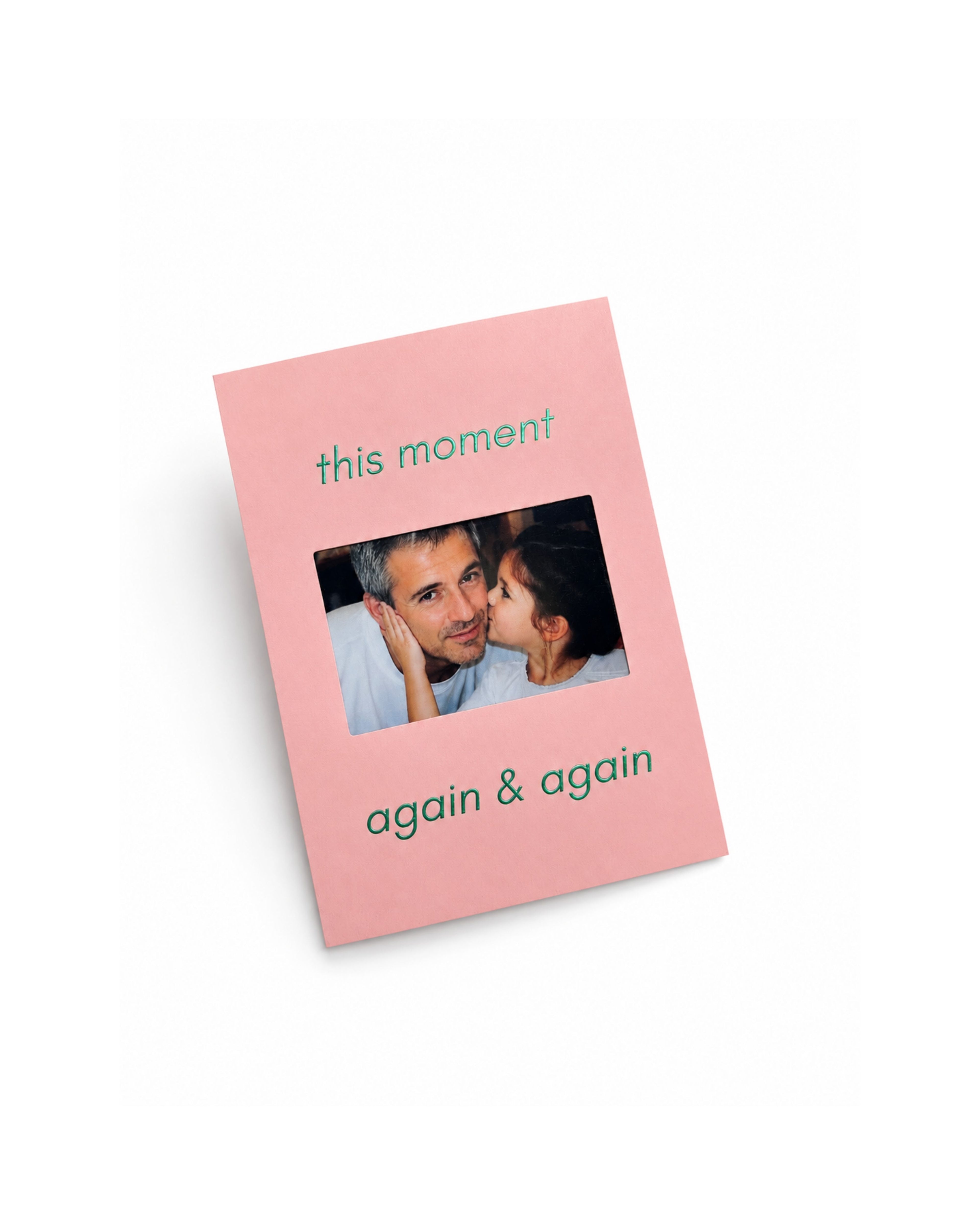 Pink KEPT photo keepsake card with green foil text reading “this moment” and “again & again,” featuring a personal photo in the center.